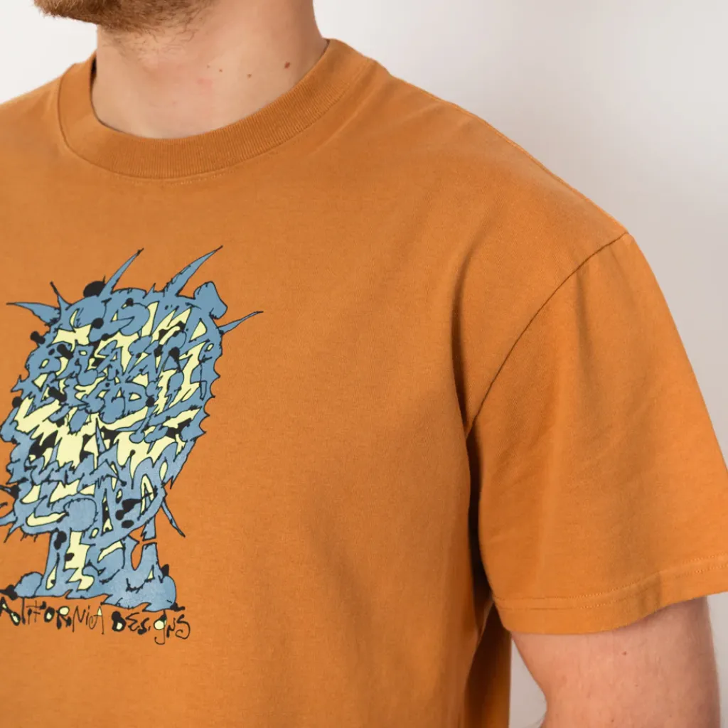 T-Shirts|Brain Dead Scrambled Head T-Shirt - Cumin